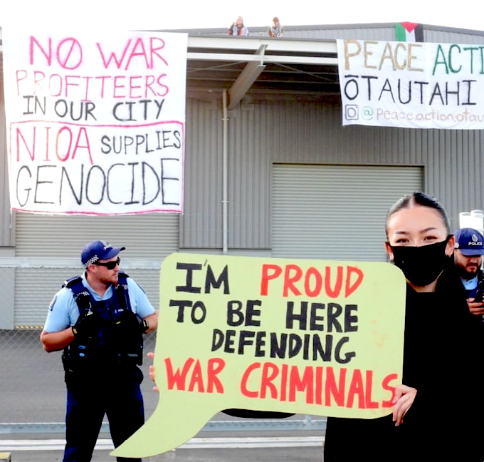 A Peace Action Ōtautahi activist at yesterday's NIOA protest