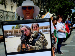 An Israeli soldiers "not welcome" placard at the Palestine solidarity rally and march in the heart of New Zealand's largest city Auckland today