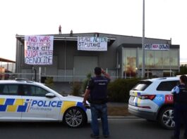 New Zealand peace protesters target a local company branch of an Australian armaments manufacturer