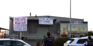 New Zealand peace protesters target a local company branch of an Australian armaments manufacturer