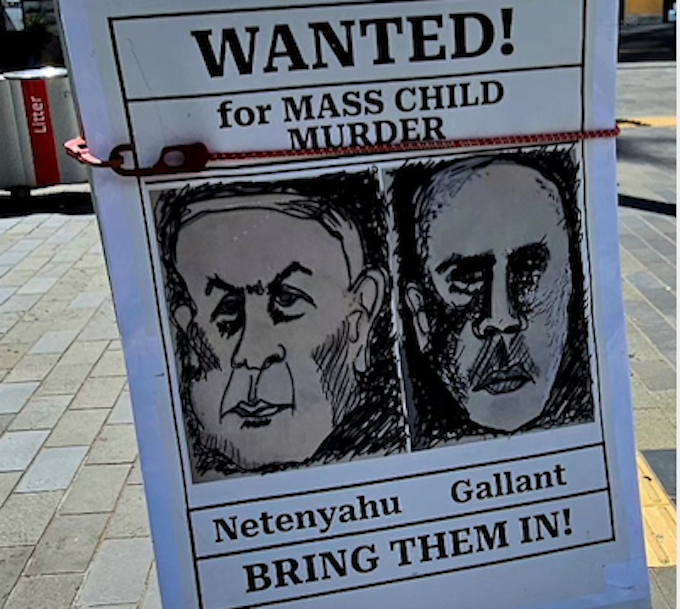 A Netanyahu "Wanted" sign at last Saturday'pro-Palestinian rally in "Palestinian Corner", Auckland