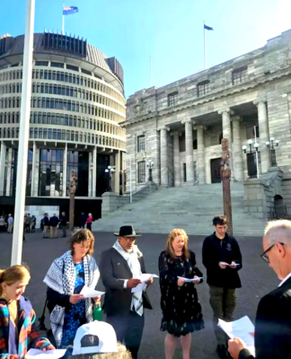 Labour Party's associate foreign affairs spokesperson Phil Twyford (right) receives the open letter