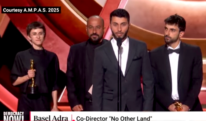 Palestinian film maker Basil Adra, co-director of No Other Land, speaking at the Oscars