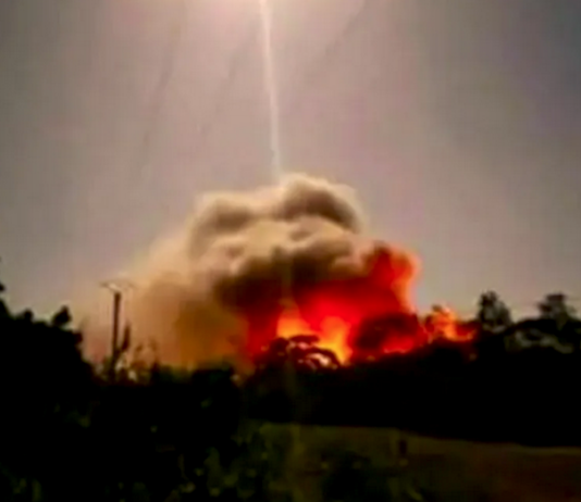 A sandalwood oil factory in flames on Maré Island