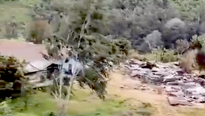 The aftermath of Indonesian forces burning temporary shelters in the Star Mountains, West Papua