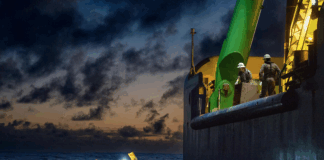 Greenpeace activists from around the world have paddled and protested around MV Coco, a specialised offshore drilling vessel