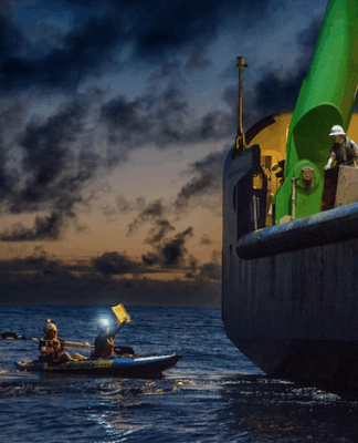 Greenpeace activists from around the world have paddled and protested around MV Coco, a specialised offshore drilling vessel