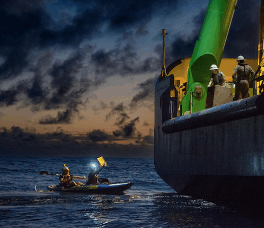 Greenpeace activists from around the world have paddled and protested around MV Coco, a specialised offshore drilling vessel