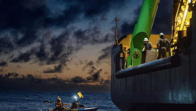 Greenpeace activists from around the world have paddled and protested around MV Coco, a specialised offshore drilling vessel