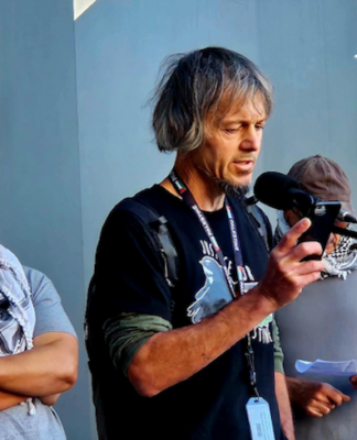 Speaker Jason Brooke at the NZ Palestine rally