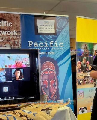 Dark Times Academy's Mandy Henk speaking at the Asia Pacific Media Network event