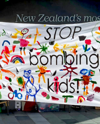 100 children killed or wounded every day since Gaza ceasefire broken "Stop bombing kids" . . . a banner at the solidarity rally in Auckland's "Palestine Corner"