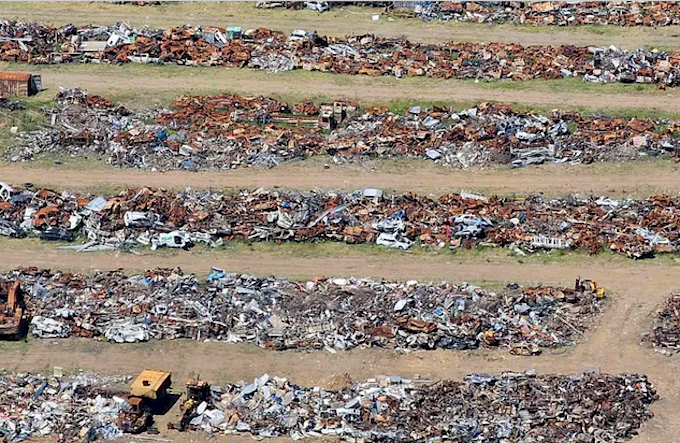 Wrecked and burnt-out cars gathered after the May 2024 riots and dumped at Koutio-Koueta on Ducos island in Nouméa