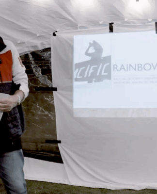 New Zealand journalist and author David Robie talks to Greenpeace activists last month about the Rainbow Warrior bombing and Rongelap voyage