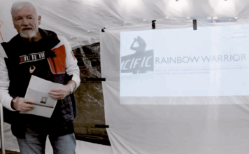 New Zealand journalist and author David Robie talks to Greenpeace activists last month about the Rainbow Warrior bombing and Rongelap voyage