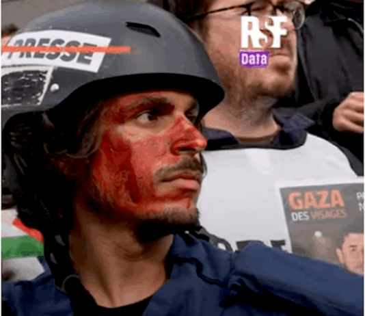 French journalists stage a "die-in" and launch a petition at a solidarity rally for Gazan reporters