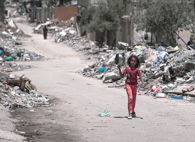 Gazan girl fetching food CC 680wide The people of Gaza are desperate. No food has entered Gaza for more than 76 days