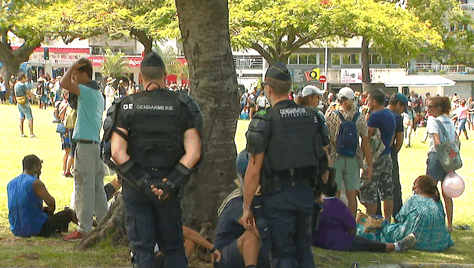 French gendarmes on guard at Noumea's central Place des Cocotiers