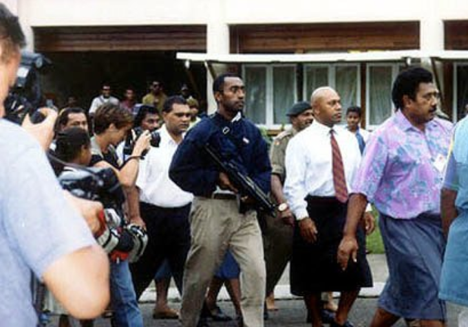 2000 attempted coup leader George Speight with a bodyguard