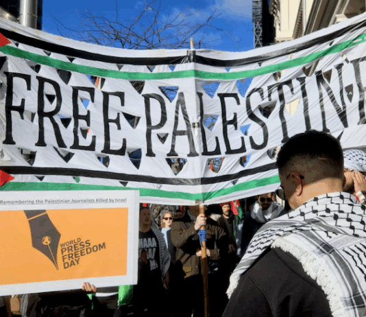 Protesters march to Television New Zealand headquarters on World Media Freedom Day