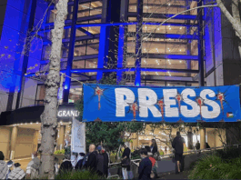 Pro-Palestine protesters outside the NZ Voyager Media Awards in Auckland tonight demonstrating against "biased" media coverage