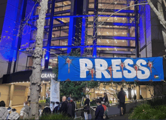 Pro-Palestine protesters outside the NZ Voyager Media Awards in Auckland tonight demonstrating against "biased" media coverage