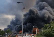 Flames and a column of smoke in New Caledonia's capital Nouméa during 2024 riots