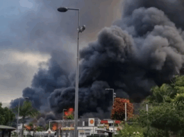 Flames and a column of smoke in New Caledonia's capital Nouméa during 2024 riots