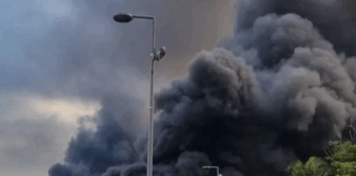 Flames and a column of smoke in New Caledonia's capital Nouméa during 2024 riots