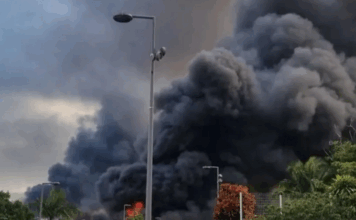Flames and a column of smoke in New Caledonia's capital Nouméa during 2024 riots