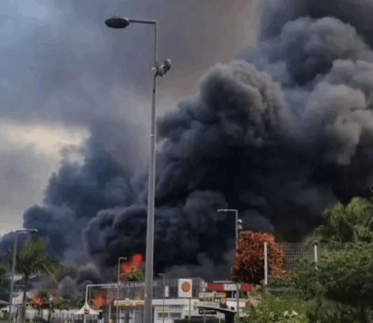 Flames and a column of smoke in New Caledonia's capital Nouméa during 2024 riots