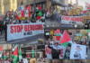 A protest by more than 2000 people in Auckland on Saturday condemned the silence of the New Zealand government