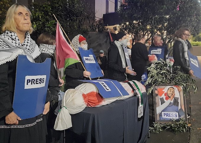 Protesters at the NZ Voyager Media Awards protesting against unbalanced media coverage of Israel's genocide