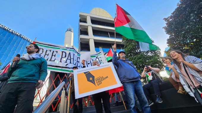 Palestinian protesters at TVNZ headquarters while demonstrating against the public broadcaster's coverage of the Israeli war against Gaza