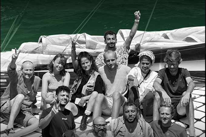 Eleven of the 12 crew members on board the humanitarian yacht Madleen