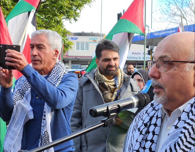 Dr Adnan Ali APR 680wide NZ Palestinian advocate Dr Adnan Ali (right) speaking at yesterday's Henderson peace rally