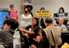 CNMI and Guam activists stage a rally protesting against the US military buildup in the Marianas