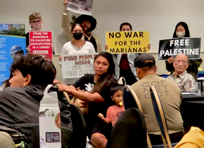 Free Palestine protest PIT 680wide CNMI and Guam activists stage a rally protesting against the US military buildup in the Marianas