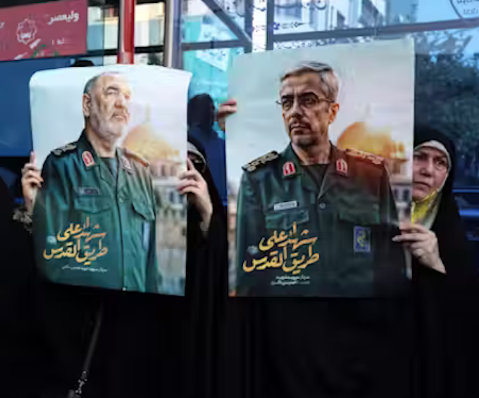 Iranian assassinations EPA 680wide Iranians hold posters of late Islamic Revolutionary Guard Corps head Hossein Salami (left), and late Iranian Armed Forces Chief of Staff General Mohammad Bagheri (right), who were killed in Israeli airstrikes in recent days