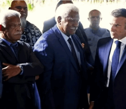 President Emmanuel Macron (right) with New Caledonia Congress former presidents Louis Mapou (left) and Roch Wamytan (centre) last yea