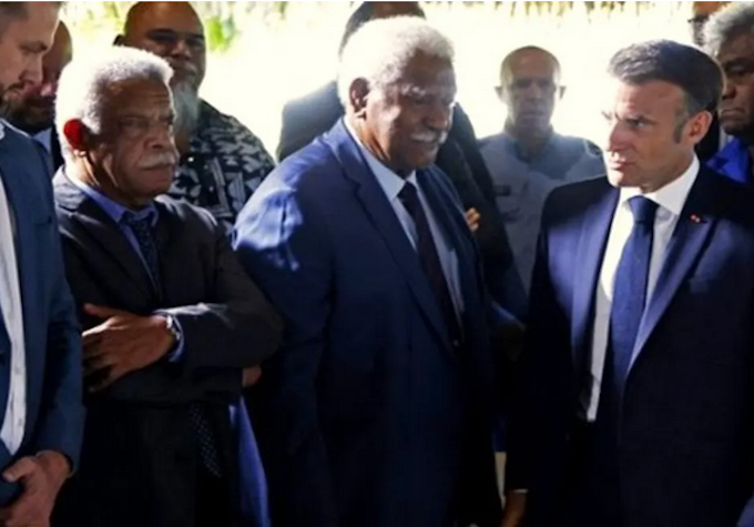 Macron & Kanaks RNZ 680wide President Emmanuel Macron (right) with New Caledonia Congress former presidents Louis Mapou (left) and Roch Wamytan (centre) last yea