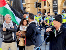 PSNA co-chair Maher Nazzal (left) at yesterday's Palestine solidarity rally in Auckland