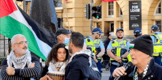 PSNA co-chair Maher Nazzal (left) at yesterday's Palestine solidarity rally in Auckland