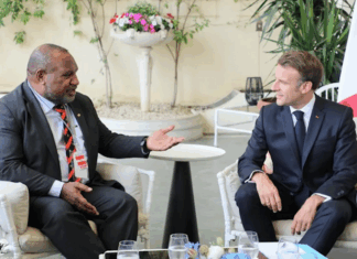PNG Prime Minister James Marape (left) and French President Emmanuel Macron