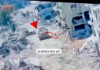 A Merkava tank in Gaza pictured at the moment a Hamas resistance fighter emerged from a tunnel to plant an explosive device