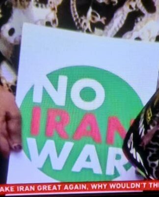 A "No Iran War" placard as protests across Iran and around the world condemn Israeli and US aggression