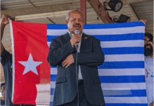 NCD Governor Powes Parkop with a West Papua flag