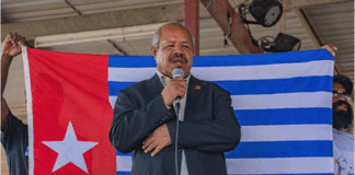 NCD Governor Powes Parkop with a West Papua flag