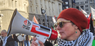 A protester at the Palestine rally against Israel's Gaza genocide and attack on Iran