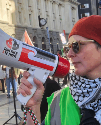 NZ Greens call on state to condemn US over ‘dangerous’ attack on Iran A protester at the Palestine rally against Israel's Gaza genocide and attack on Iran